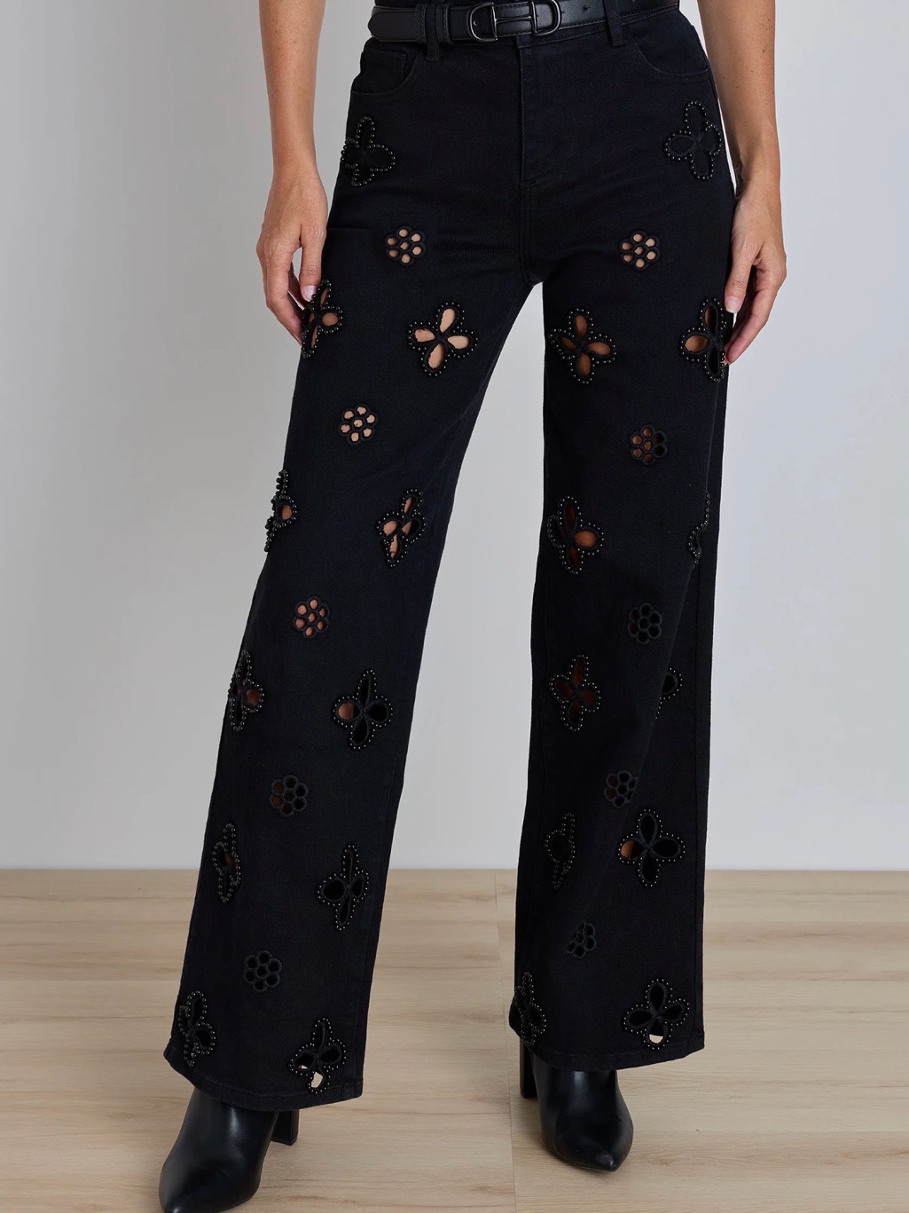 Noli Black Wide-Leg Jeans With Floral Cutout Accents